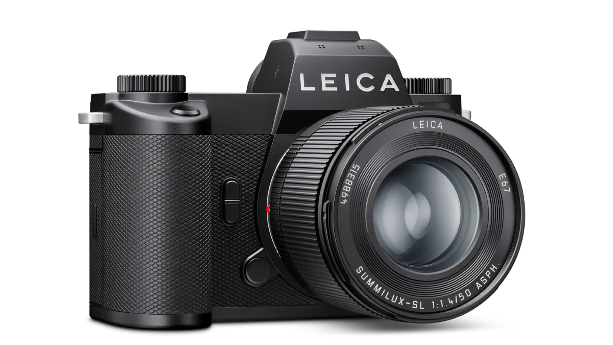 Front three-quarter view of a black Leica SL3-P fitted with a Summilux-SL 50 f/1.4 ASPH. lens on a white background.