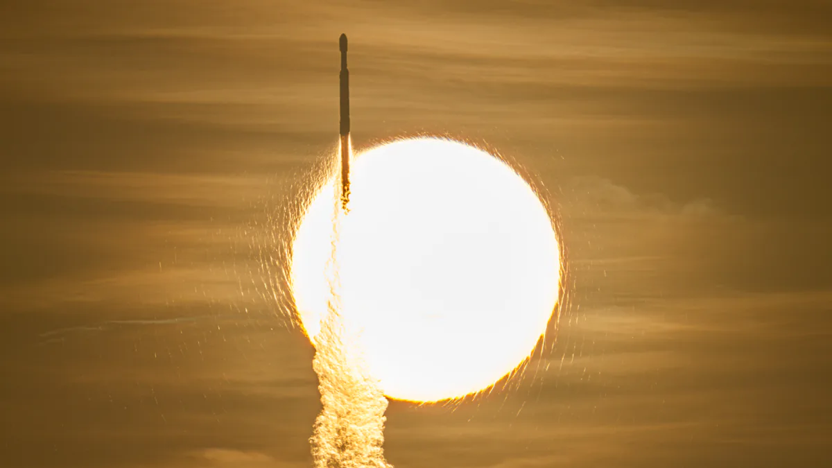 A SpaceX Falcon Heavy carrying NASA's Roman Space Telescope rises across the bright disk of the Sun.